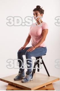 Sitting pose blue jeans pink t shirt of Oxana …